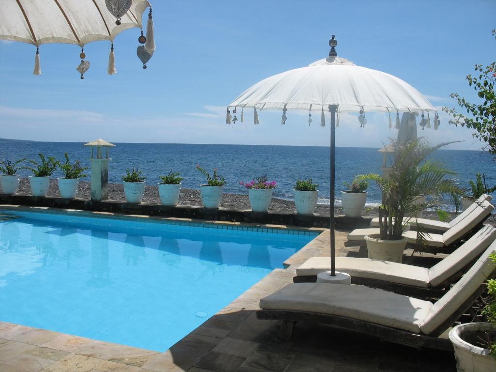 Kembali Beach Bungalows Амед Экстерьер фото