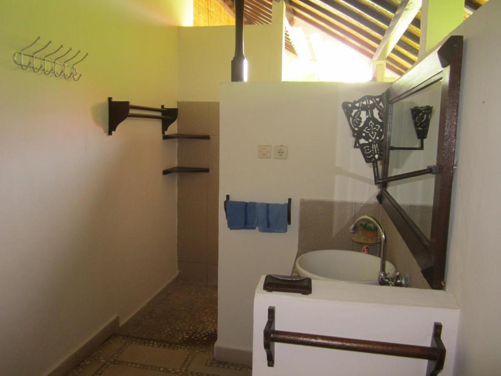 Kembali Beach Bungalows Амед Номер фото